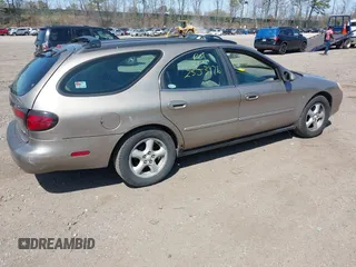 2003 Ford Taurus SE Standard with VIN 1FAHP58S13A147675, listed as a IAAI auction lot 42079930 with 87,523 mi miles and . Bid and sale history available at DreamBid. Image 4.
