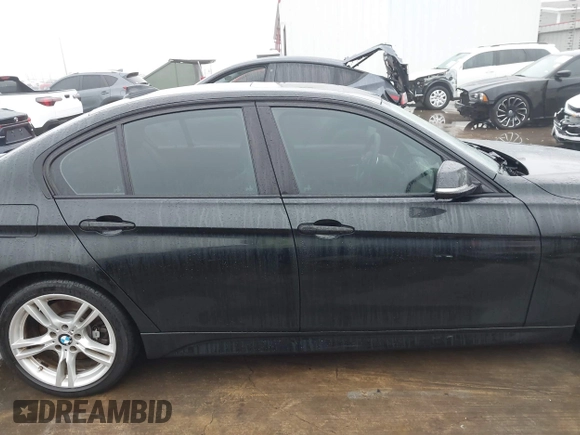 2014 BMW 3 Series 335i with VIN WBA3A9C57EF477662, listed as a IAAI auction lot 41435544 with 129,543 mi miles. Bid and sale history available at carsss.com. Image 14.