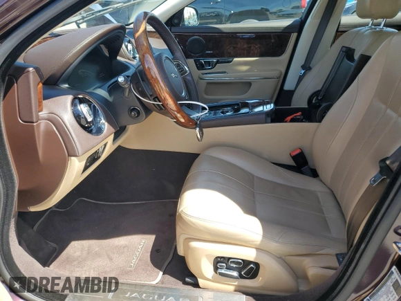 2014 Jaguar XJ with VIN SAJWA1CZ3E8V69877, listed as a Copart auction lot 51520405 with 57,567 mi miles and Clean Title. Bid and sale history available at DreamBid. Image 7.