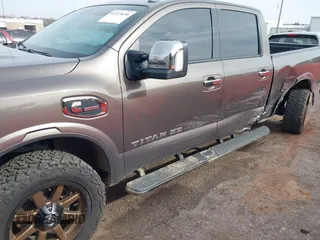 2016 Nissan Titan XD PRO-4X with VIN 1N6BA1F47GN504416, listed as a IAAI auction lot 41223650 with 168,440 mi miles. Bid and sale history available at carsss.com. Image 6.