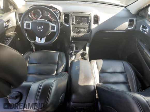 2013 Dodge Durango Crew with VIN 1C4RDJDG5DC701016, listed as a Copart auction lot 60832385 with 236,719 mi miles and Salvage title. Bid and sale history available at DreamBid. Image 8.
