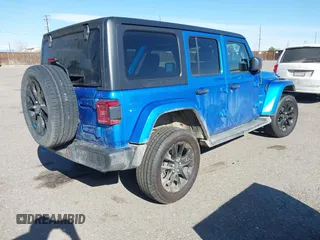 2023 Jeep Wrangler Sahara z VIN 1C4JJXP60PW513969, wystawiony jako IAAI lot #41766631 z przebiegiem 34 819 mil mil oraz . Historia ofert i sprzedaży dostępna na DreamBid. Obrazek 4.