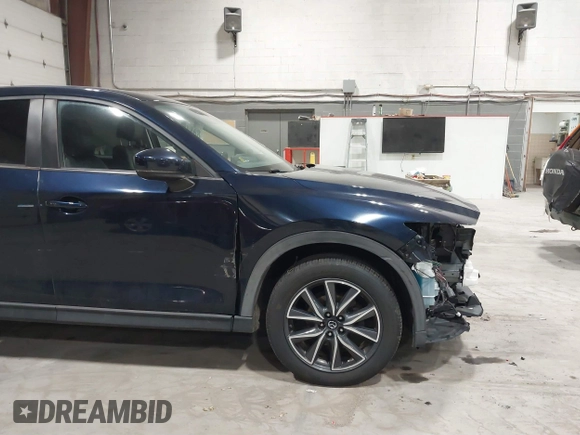 2018 Mazda CX-5 Touring with VIN JM3KFBCM5J0434716, listed as a IAAI auction lot 41738956 with 108,264 mi miles and . Bid and sale history available at DreamBid. Image 19.