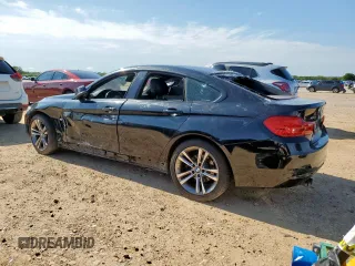2015 BMW 4 Series 428i xDrive with VIN WBA4C9C58FG135373, listed as a Copart auction lot 58545155 with 122,732 mi miles and Salvage title. Bid and sale history available at DreamBid. Image 2.