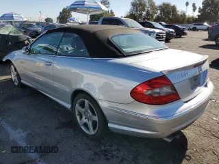 2007 Mercedes-Benz CLK 550 with VIN WDBTK72F27T076330, listed as a Copart auction lot 80770694 with 126,018 mi miles and Salvage Title. Bid and sale history available at DreamBid. Image 2.