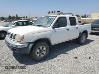 2000 Nissan Frontier XE with VIN 1N6ED27T8YC436513, listed as a Copart auction lot 60338695 with 307,757 mi miles and Clean title. Bid and sale history available at DreamBid. Image 1.