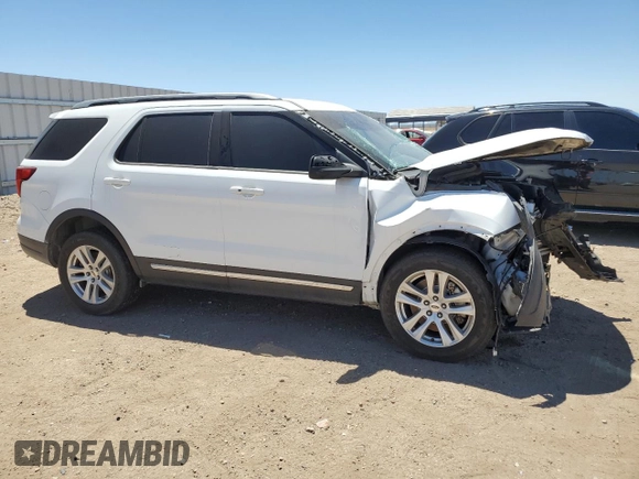 2019 Ford Explorer XLT z VIN 1FM5K8D88KGA42873, wystawiony jako Copart lot #64584935 z przebiegiem 143 439 mil mil oraz Szkoda całkowita • Salvage title. Historia ofert i sprzedaży dostępna na DreamBid. Obrazek 4.