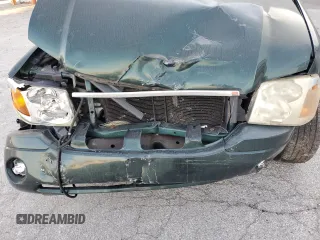 2005 GMC Envoy SLT with VIN 1GKDS13S652329610, listed as a Copart auction lot 76384914 with Not Provided miles and Salvage Title. Bid and sale history available at DreamBid. Image 12.
