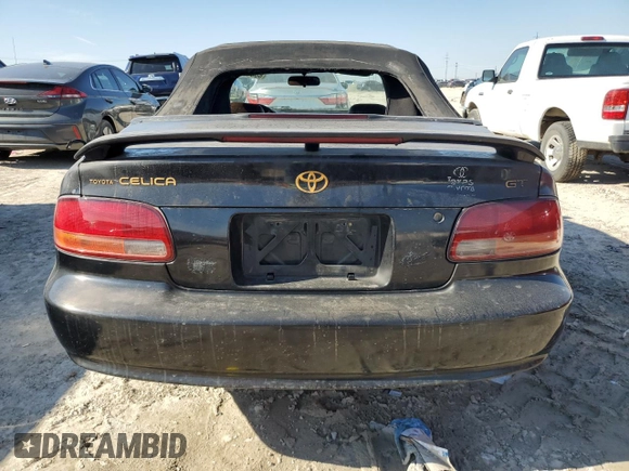 1998 Toyota Celica GT z VIN JT5FG02T2W0049461, wystawiony jako Copart lot #88813795 z przebiegiem 191 123 mil mil oraz Czysty tytuł • Clean title. Historia ofert i sprzedaży dostępna na DreamBid. Obrazek 6.