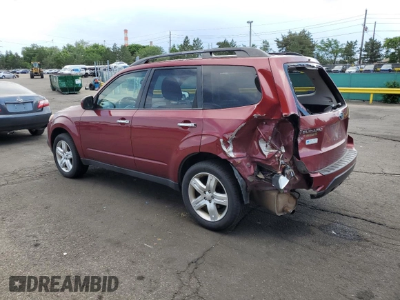 2009 Subaru Forester X with VIN JF2SH63609H795510, listed as a Copart auction lot 61041205 with 218,834 mi miles and Salvage title. Bid and sale history available at DreamBid. Image 2.