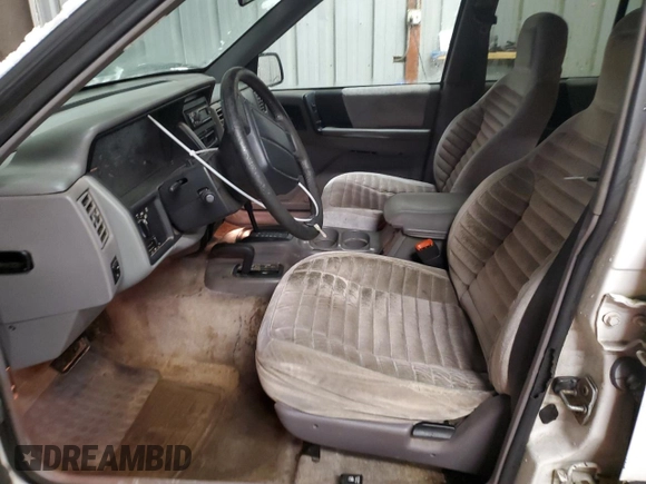 1995 Jeep Grand Cherokee Laredo with VIN 1J4GZ58S6SC630947, listed as a Copart auction lot 82143564 with 267,946 mi miles and Salvage Title. Bid and sale history available at carsss.com. Image 7.
