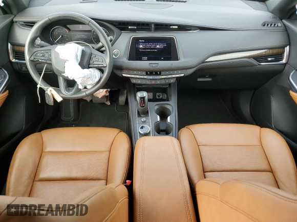 2019 Cadillac XT4 FWD Premium Luxury с VIN 1GYFZCR4XKF229304, выставлен на аукционе Copart как лот 62272325 с пробегом 26 322 миль миль и Списание • Salvage title. История ставок и продаж доступна на DreamBid. Изображение 8.