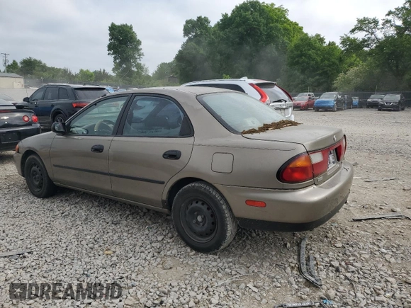1997 Mazda Protege DX z VIN JM1BC1414V0103244, wystawiony jako Copart lot #56219745 z przebiegiem Nie podano mil oraz Szkoda całkowita • Salvage title. Historia ofert i sprzedaży dostępna na DreamBid. Obrazek 2.