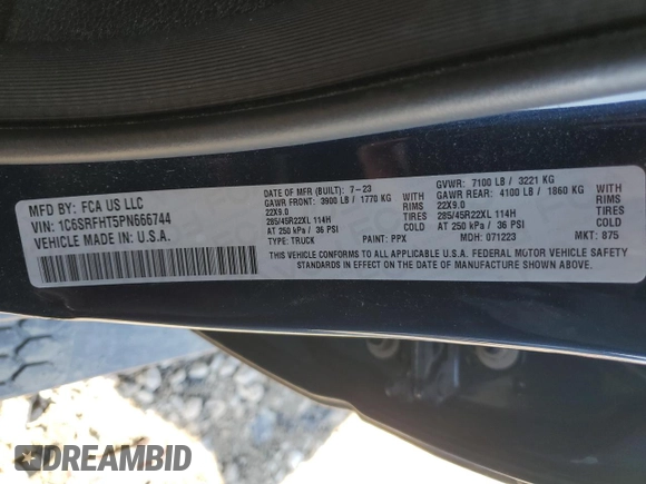 2023 Ram 1500 Limited with VIN 1C6SRFHT5PN666744, listed as a Copart auction lot 48538235 with 54,446 mi miles and Salvage title. Bid and sale history available at DreamBid. Image 12.