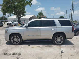 2015 Cadillac Escalade Premium z VIN 1GYS3NKJ0FR500158, wystawiony jako IAAI lot #42439343 z przebiegiem 159 487 mil mil oraz . Historia ofert i sprzedaży dostępna na DreamBid. Obrazek 14.