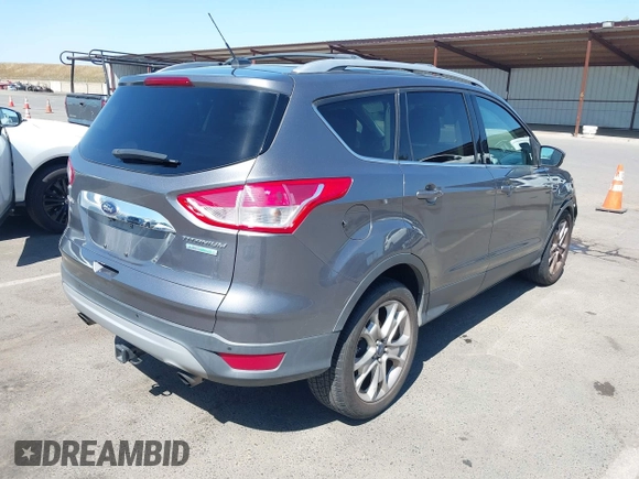 2014 Ford Escape Titanium с VIN 1FMCU0J95EUC22897, выставлен на аукционе IAAI как лот 42204135 с пробегом 144 534 миль миль и . История ставок и продаж доступна на DreamBid. Изображение 4.