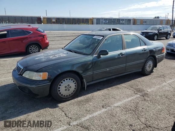 1996 Acura RL with VIN JH4KA965XTC009917, listed as a Copart auction lot 65083665 with 197,486 mi miles and Salvage title. Bid and sale history available at DreamBid. Image 1.