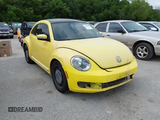 2013 Volkswagen Beetle 2.5L w/Sun/Sound/Nav with VIN 3VWJX7AT2DM680808, listed as a IAAI auction lot 42141906 with 113,399 mi miles and . Bid and sale history available at DreamBid. Image 1.