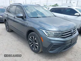 2022 Volkswagen Tiguan S z VIN 3VV1B7AX7NM051259, wystawiony jako IAAI lot #42146173 z przebiegiem 52 106 mil mil oraz . Historia ofert i sprzedaży dostępna na DreamBid. Obrazek 1.