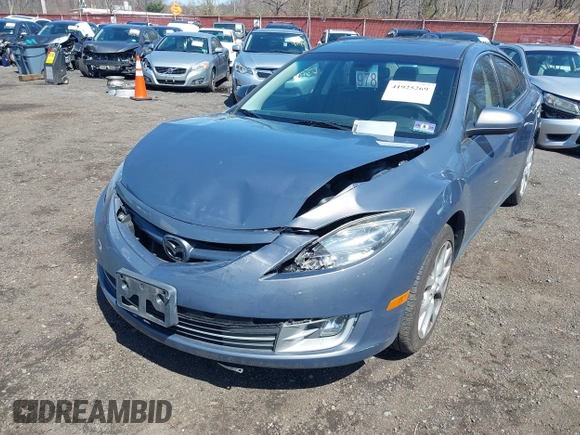 2009 Mazda 6 S Grand Touring with VIN 1YVHP82B795M01762, listed as a IAAI auction lot 41925269 with 163,967 mi miles and . Bid and sale history available at DreamBid. Image 6.