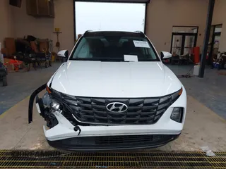 2022 Hyundai Tucson SEL Convenience with VIN KM8JFCA1XNU075554, listed as a IAAI auction lot 41617350 with 29,676 mi miles and . Bid and sale history available at carsss.com. Image 12.