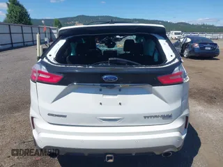 2020 Ford Edge Titanium z VIN 2FMPK4K96LBB46218, wystawiony jako IAAI lot #42750160 z przebiegiem 56 720 mil mil oraz . Historia ofert i sprzedaży dostępna na DreamBid. Obrazek 17.