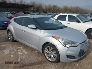 2016 Hyundai Veloster z VIN KMHTC6AD1GU269440, wystawiony jako IAAI lot #41682653 z przebiegiem Nie podano mil oraz . Historia ofert i sprzedaży dostępna na DreamBid. Obrazek 1.
