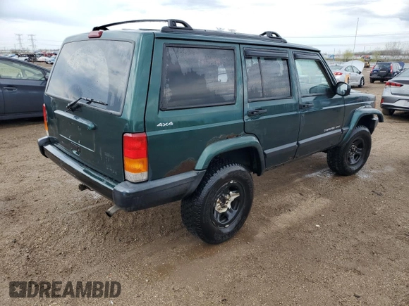 2000 Jeep Cherokee with VIN 1J4FF48S3YL149593, listed as a Copart auction lot 52489045 with 290,231 mi miles and Salvage title. Bid and sale history available at DreamBid. Image 3.