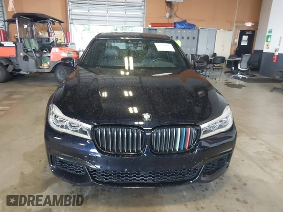 2019 BMW 7 Series 750i xDrive with VIN WBA7F2C51KB239044, listed as a IAAI auction lot 42756026 with 65,028 mi miles and . Bid and sale history available at DreamBid. Image 6.