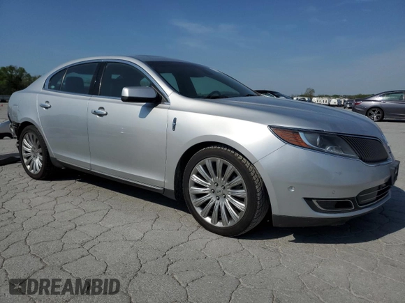 2013 Lincoln MKS with VIN 1LNHL9EK0DG612314, listed as a Copart auction lot 52901685 with 124,828 mi miles and Salvage title. Bid and sale history available at DreamBid. Image 4.