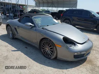 2007 Porsche Boxster S z VIN WP0CB29887U731046, wystawiony jako IAAI lot #42191204 z przebiegiem 153 037 mil mil oraz . Historia ofert i sprzedaży dostępna na DreamBid. Obrazek 1.