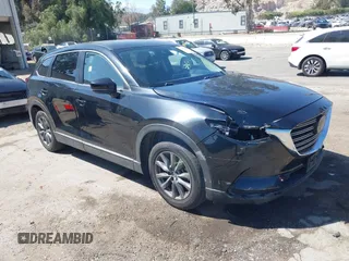 2020 Mazda CX-9 Sport with VIN JM3TCABY8L0407430, listed as a IAAI auction lot 42288490 with 50,317 mi miles and . Bid and sale history available at DreamBid. Image 1.