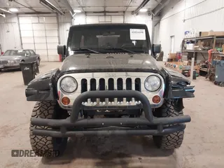 2008 Jeep Wrangler Unlimited X with VIN 1J4GA391X8L558984, listed as a IAAI auction lot 41016498 with 123,308 mi miles. Bid and sale history available at carsss.com. Image 12.