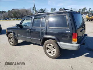 2000 Jeep Cherokee Classic with VIN 1J4FF58S3YL171454, listed as a Copart auction lot 42945485 with 218,721 mi miles and Salvage Title. Bid and sale history available at carsss.com. Image 2.