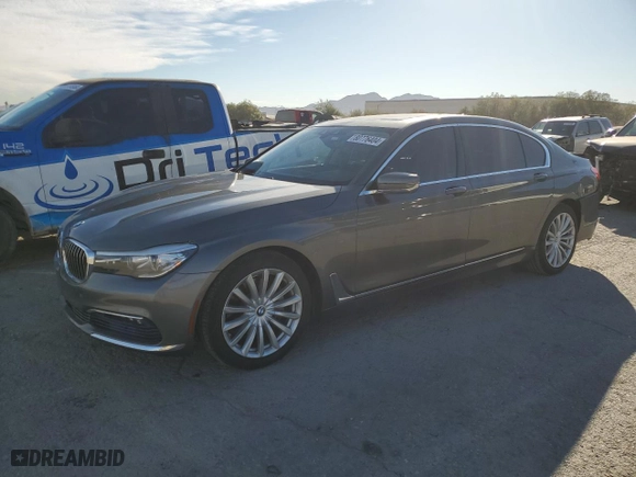 2016 BMW 7 Series 740i with VIN WBA7E2C53GG714464, listed as a Copart auction lot 80776404 with 80,693 mi miles and Salvage Title. Bid and sale history available at carsss.com. Image 1.