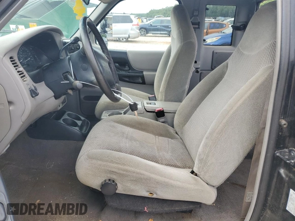 2000 Ford Ranger XLT with VIN 1FTZR15X4YPA74632, listed as a Copart auction lot 58438345 with 139,703 mi miles and Salvage title. Bid and sale history available at DreamBid. Image 7.