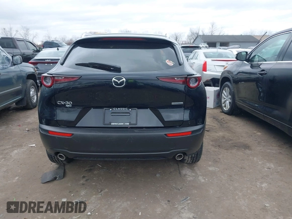 2023 Mazda CX-30 S Carbon Edition with VIN 3MVDMBCMXPM553129, listed as a IAAI auction lot 41864876 with 18,317 mi miles and . Bid and sale history available at DreamBid. Image 17.
