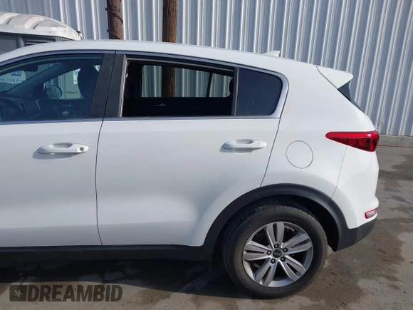 2019 Kia Sportage LX with VIN KNDPM3AC0K7535675, listed as a IAAI auction lot 41933482 with 118,012 mi miles and . Bid and sale history available at DreamBid. Image 6.