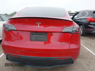 2022 Tesla Model Y Performance z VIN 7SAYGDEF6NF511436, wystawiony jako IAAI lot #42078122 z przebiegiem 44 006 mil mil oraz . Historia ofert i sprzedaży dostępna na DreamBid. Obrazek 16.