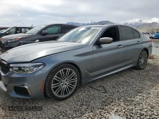 2018 BMW 5 Series M550i xDrive with VIN WBAJB9C51JB034980, listed as a Copart auction lot 51052495 with 55,705 mi miles and Clean Title. Bid and sale history available at carsss.com. Image 1.