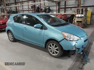2014 Toyota Prius One z VIN JTDKDTB3XE1060360, wystawiony jako IAAI lot #41972531 z przebiegiem 140 012 mil mil oraz . Historia ofert i sprzedaży dostępna na DreamBid. Obrazek 1.