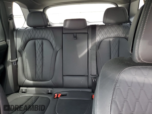 2023 BMW X5 xDrive45e z VIN 5UXTA6C01P9R61137, wystawiony jako Copart lot #56458155 z przebiegiem 27 501 mil mil oraz Szkoda całkowita • Salvage title. Historia ofert i sprzedaży dostępna na DreamBid. Obrazek 10.