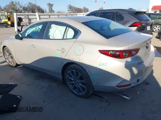 2025 Mazda 3 S Preferred with VIN 3MZBPACM9SM450395, listed as a IAAI auction lot 41132298 with 773 mi miles and . Bid and sale history available at DreamBid. Image 3.