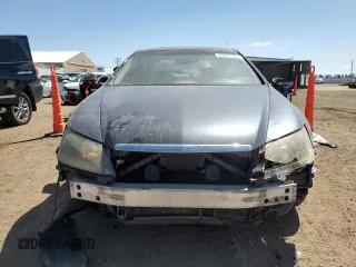 2005 Acura RL z VIN JH4KB16555C002164, wystawiony jako Copart lot #54937525 z przebiegiem 185 631 mil mil oraz Szkody całkowita. Historia ofert i sprzedaży dostępna na DreamBid. Obrazek 5.