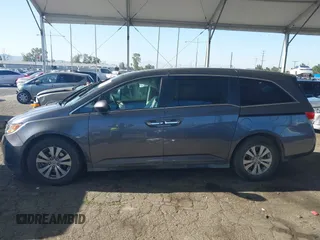 2014 Honda Odyssey EX-L with VIN 5FNRL5H61EB079742, listed as a IAAI auction lot 41992473 with 125,397 mi miles and . Bid and sale history available at carsss.com. Image 14.