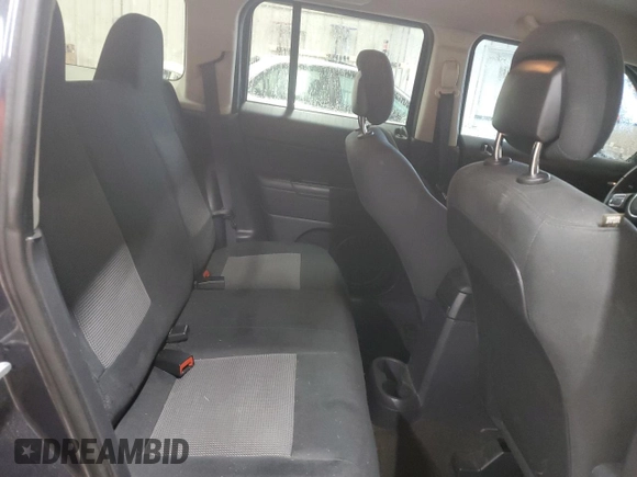 2015 Jeep Patriot Latitude with VIN 1C4NJRFB0FD125811, listed as a Copart auction lot 56658815 with 169,500 mi miles and Clean title. Bid and sale history available at DreamBid. Image 11.