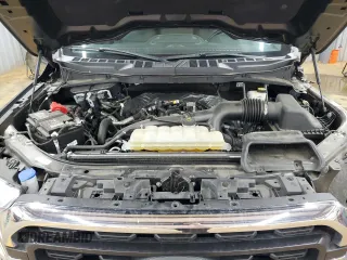 2021 Ford F-150 XL with VIN 1FTMF1EP7MKE58611, listed as a Copart auction lot 56912955 with 30,850 mi miles and Salvage title. Bid and sale history available at DreamBid. Image 11.