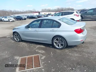 2014 BMW 3 Series 328i xDrive with VIN WBA3B3C58EJ980379, listed as a IAAI auction lot 41678676 with 183,278 mi miles. Bid and sale history available at carsss.com. Image 14.