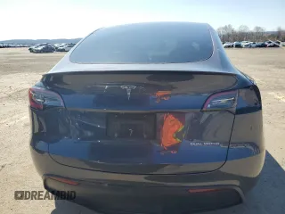 2023 Tesla Model Y Performance z VIN 7SAYGDEF9PF865129, wystawiony jako Copart lot #50228735 z przebiegiem Nie podano mil oraz Szkoda całkowita • Salvage title. Historia ofert i sprzedaży dostępna na DreamBid. Obrazek 6.