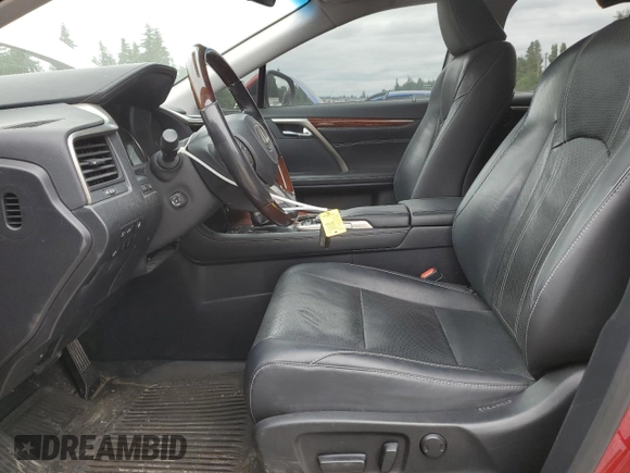 2018 Lexus RX 450hL Premium with VIN JTJDGKCA5J2002701, listed as a Copart auction lot 60258935 with 73,437 mi miles and Salvage title. Bid and sale history available at DreamBid. Image 7.